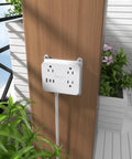 Flat Plug Power Strip With USB Ports And 3 Widely Spaced Outlets mounted on wall with 5ft extension cord, white design.