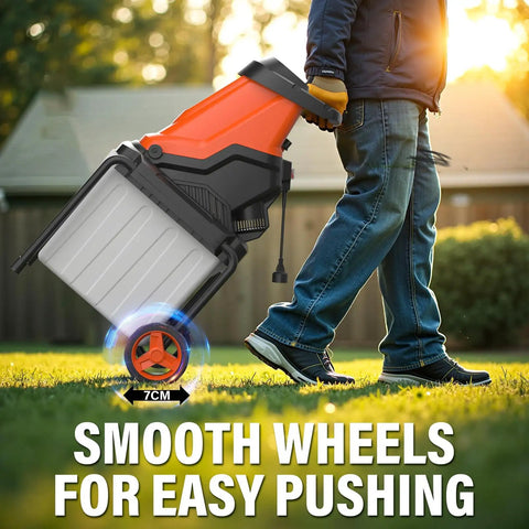 Person pushing Powerful 15-Amp Wood Chipper Shredder with 50L Collection Bin, smooth wheels, yard background, morning light