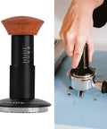 Heavy Hitter Spring Loaded Coffee Tamper With Precision Distribution Leveler And Clear Pressure Scale For Flawless Espresso Pucks on counter