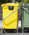 Yellow and green bins on Heavy Duty 6 Inch Plate Caster Wheels With Rubber On Cast Iron Core, 1000 Lb Per Caster Capacity