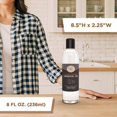 8 oz food-grade mineral oil for wood cutting boards and butcher blocks food safe wood conditioner on kitchen counter.