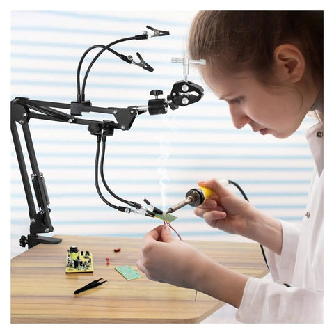 Person using Third Hand Soldering Station With Adjustable Gooseneck Arms And PCB Holder Welding Help Tool For Precise Desoldering And Electronics Repair Perfect For DIYers Makers And Hobbyists