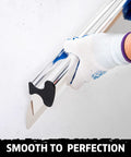 Applying Pro Grade Drywall Skimming Blade Set With Extension Handles for Quick Finishes on wall, smooth finish, caption Smooth to Perfection