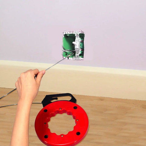 Using Wxtools 100 Ft Fish Tape For Electric Wire Pulling Reel with Durable Handle to pull wires from wall outlet.