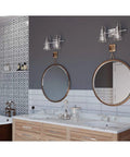 Litchfield Two Light Chrome Bath Vanity Light Fixture above dual mirrors in modern coastal bathroom with spa-like decor.