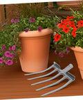 Heavy Duty Steel Garden Fork For Soil Loosening And Planting Area Prep beside flower pots on wooden deck