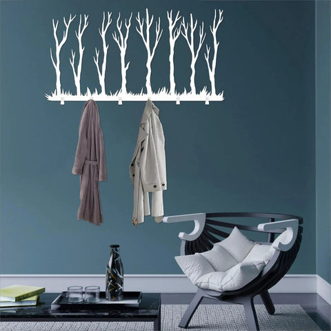 Rustic Winter Tree Grove Metal Wall Hooks with two coats hung, minimalist branch design for entryway decor.