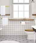 Brass Bathroom Hardware Set in Brushed Gold with towel bar and towel ring in modern tiled bathroom
