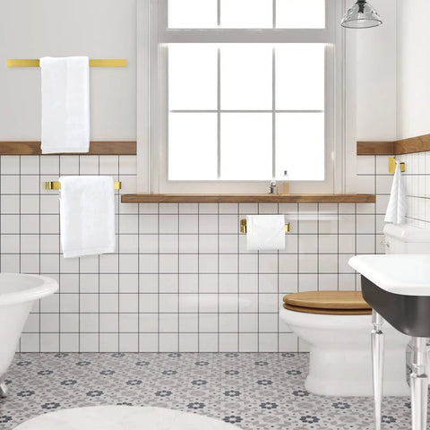 Brass Bathroom Hardware Set in Brushed Gold with towel bar and towel ring in modern tiled bathroom