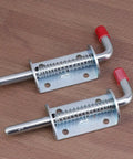 Premium Stainless Steel Spring Loaded Gate Latch And Bolt Hardware Set For Utility Dump Trailers Barn Doors close-up view showing spring mechanism.