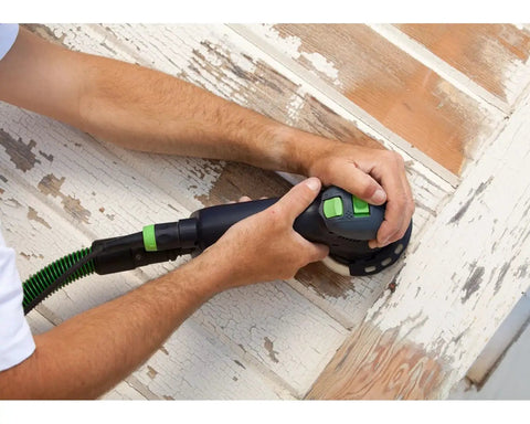 Using Rotex RO 125 FEQ-Plus Random Orbital Sander With Gear Driven Aggressive Mode And Jetstream Dust Extraction on wood surface
