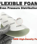 Pro Grade 6 Inch Foam Sanding Discs 15 Pack 3000 Grit flexibility and texture close-up with glove holding sandpaper