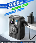 F2 128GB Dual Screen Body Camera With GPS 2K Video And 40MP Photos charging on a power strip with built-in 3000mAh battery
