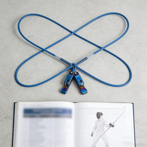 Fencing Foil Cord For Epee Mask With Clamp Clear Body Cable on open book background