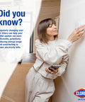 Person adjusting thermostat representing benefits of MERV 13 Pleated HVAC Air Filter 20X25X1 Pack Of 4 For Allergies, Dust, and Pollen.