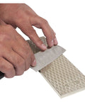 Sharpening a knife on 8 Inch Diamond Sharpening And Flattening Stone Double Sided 180/600 Grit Bench Stone With Pouch Cleaning Block
