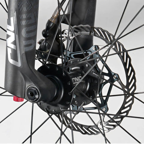 Close-up of Front Thru Axle Set 15x100mm And 15x110mm Boost For RockShox Forks Aluminum Alloy on mountain bike fork