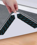 16 Pcs Rug Tape Non Slip Rug Grippers For Hardwood Floors And Tile showing adhesive strip under rug corner