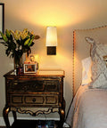 Farmhouse Black Wall Sconces Set Of Two, Modern 1 Light Hardwired Matte Black Wall Lamp With Fabric Shade in a bedroom setting