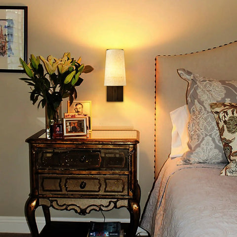 Farmhouse Black Wall Sconces Set Of Two, Modern 1 Light Hardwired Matte Black Wall Lamp With Fabric Shade in a bedroom setting