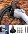 Heavy Duty EV Charger Wall Mount Holder For SAE J1772 Electric Vehicle Nozzle mounted on a brick wall with charging cable.