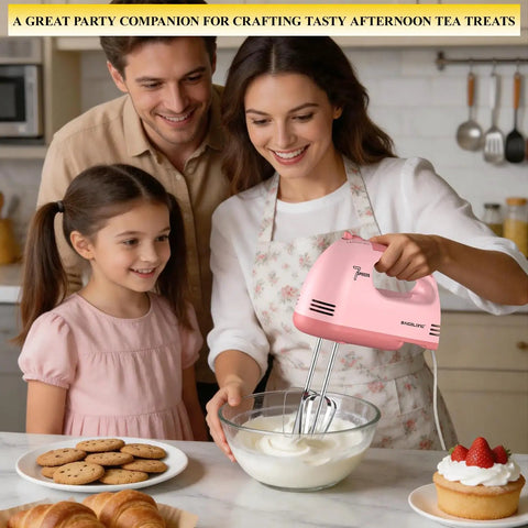 Family using Heavy Duty Pink Hand Mixer With Seven Speed Settings And Five Durable Stainless Steel Attachments Including Flat Beaters Dough Hooks And A Balloon Whisk Plus Secure Storing Case For Nailing Every Bake And Weekend Kitchen Champs.