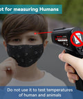 Non-Contact Infrared Thermometer Gun With Backlit Display, Instant Read From -50C To 550C, 12 To 1 Distance Spot Ratio, Adjustable Emissivity, Go-To Handheld Laser IR Thermometer For Home, Kitchen, Automotive, Black, aimed at a masked child
