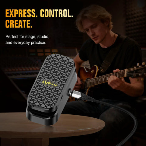 Musician using Dual Function Volume And Expression Gig Ready Pedal For Electric Guitar With Passive Foot Controller in studio