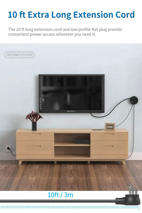 10 Foot Flat Plug Extension Cord With USB Port powering TV in living room, showcasing slim design for behind furniture.