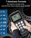 Portable Metal Hardness Tester Kit With Test Block Pen Type Gauge Seven Hardness Scales On The Go held by hands displaying measurement.