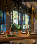 2 Pack Cordless Desk Lamps With Rechargeable 5000mAh LED Battery, Metal USB Powered Table Lamps, shown in a restaurant setting