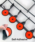 Auto Resetting BB Gun Targets For .177 And .20 Caliber with Stickers showing self-adhesive feature on black steel targets
