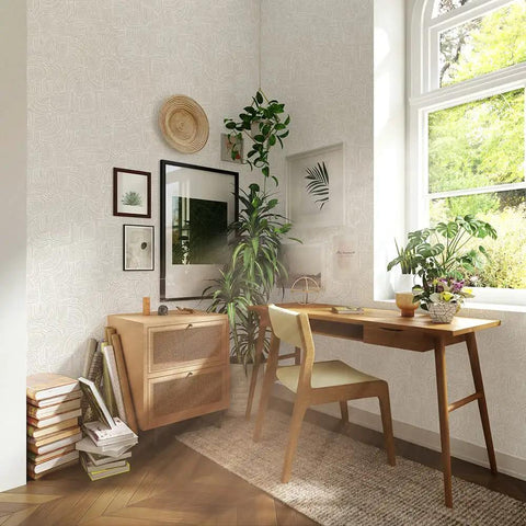 Living room with Sand Swirl Swell Removable Peel And Stick Wallpaper With Retro Curves, 20.5 In Wide, showing furniture and plants.
