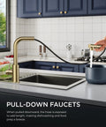 Gold Kitchen Faucet With Pull Down Sprayer In Stainless Steel Single Handle Sink Faucet shown with 360° swiveling spray in use