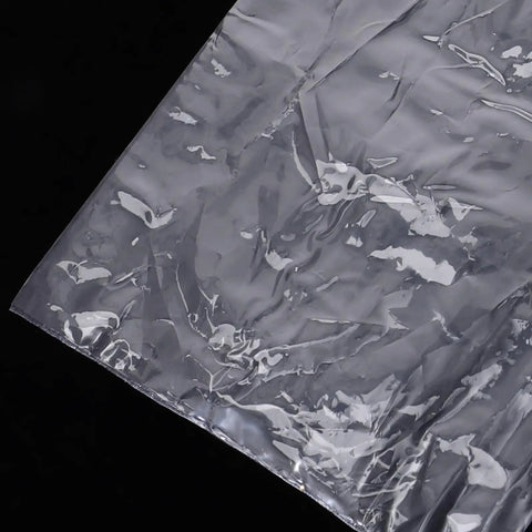100Pcs PVC Heat Shrink Wrap Bags For Bottles And Medicine Easy To Use Sealing Film That Keeps Products Fresher Clear Plastic Shrink Wrap For Packaging And Shipping Great For Bulk Bottling DIY Craft And Makeup Storage, clear PVC shrink bag close-up