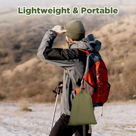 Hiker with backpack carrying Go To Camping Hammock With Rain Fly Tarp And Built In Mosquito Net, Tree Straps Included