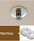 Pro Grade Ten Piece Fire Sprinkler Escutcheon Covers mounted on ceiling with polished stainless steel finish and twin disc design.