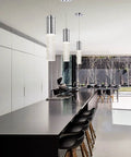 Dope Polished Chrome Bubble Glass Mini Pendant Lights Set With Integrated LED Dimmable Modern Contemporary Kitchen Island Hanging Fixtures One Light Per Pendant Two Pack illuminating a modern kitchen island.