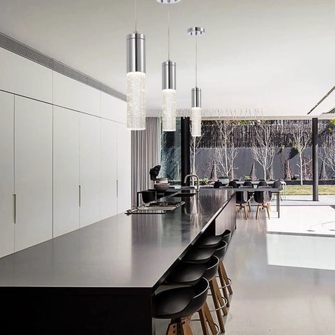 Dope Polished Chrome Bubble Glass Mini Pendant Lights Set With Integrated LED Dimmable Modern Contemporary Kitchen Island Hanging Fixtures One Light Per Pendant Two Pack illuminating a modern kitchen island.