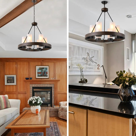 Farmhouse Wagon Wheel Six Light Chandelier with frosted seeded glass shades hanging in dining room, all metal construction.
