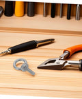 Stainless Steel Eyebolts With Closed Ring M6x20 For Heavy Duty Hanging, Beefy Load Bearing Eye Bolts With Washer And Nut, Concrete Or Wood Anchor Screws, Durable, Secure Mounts For Outdoor Gear Or Equipment. Eyebolt on wood with pliers
