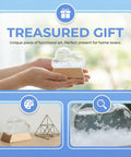 Hands holding a cloud-shaped storm glass weather forecaster on wooden base, marked as a treasured gift, with decorative background.