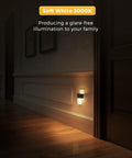 Two Pack Plug In Night Light With Dusk To Dawn Auto On Off, Soft White 3000K Cozy Glow, Rustic Black Frame Night Light illuminating hallway