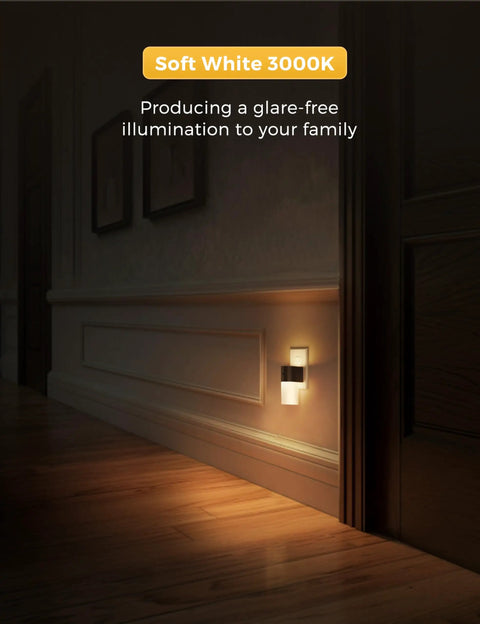 Two Pack Plug In Night Light With Dusk To Dawn Auto On Off, Soft White 3000K Cozy Glow, Rustic Black Frame Night Light illuminating hallway