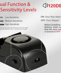 Close-up of Dual Protection Door Lock Alarm Kit showing sensitivity levels and switch options for travel and home use.