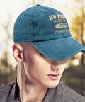 Man wearing Funny RV Pilot Hat For Men Cyan Blue Camper Road Trip Cap with Adjustable Strap, blurred outdoor background