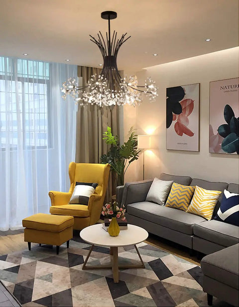 Modern Firework Crystal Dandelion Chandelier Pendant Lighting in living room with yellow chair and grey sofa, black ceiling fixture