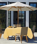 Yellow Square Table Cover and Tablecloth for Indoor Outdoor Use With Umbrella Hole And Zipper Waterproof Washable Wrinkle Free 60x60 Inches on patio table with chairs