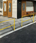 Heavy Duty Industrial Safety Railing 72 Long By 42 High Rock Solid Steel Pipe Guardrail installed outside a building.