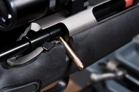 Close-up of rifle with Universal Bore Guide With Three Muzzle Guides for cleaning rod alignment and solvent flow directing.